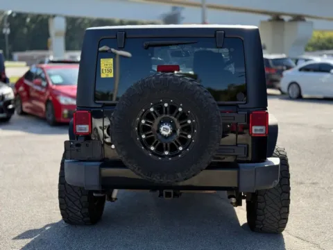 More photos of 2015 Jeep Wrangler Willys Wheeler at AUTOLAND, FL