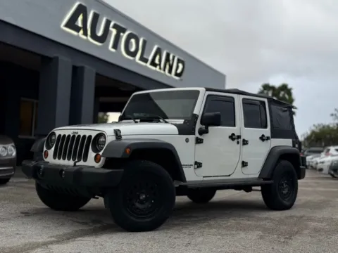 White 2009 Jeep Wrangler Unlimited X for sale in Jacksonville, FL