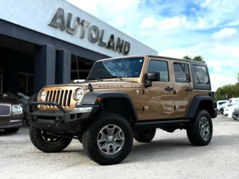 Brown 2015 Jeep Wrangler Unlimited Rubicon for sale in Jacksonville, FL