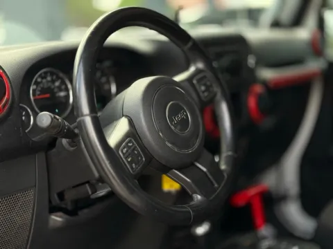 Photos of 2014 Jeep Wrangler Willys Wheeler for sale in Jacksonville, FL at AUTOLAND