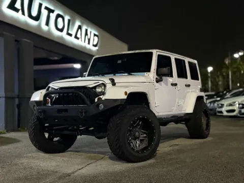 White 2013 Jeep Wrangler Unlimited Sahara for sale in Jacksonville, FL