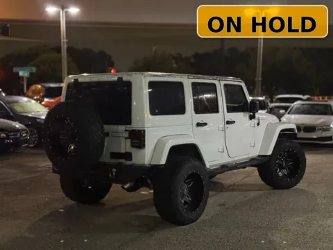 More photos of 2013 Jeep Wrangler Unlimited Sahara at AUTOLAND, FL
