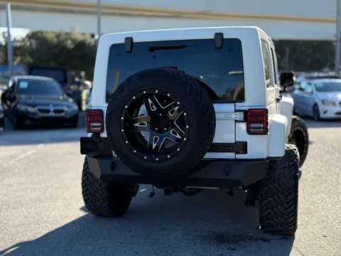 Another view of 2013 Jeep Wrangler Unlimited Sahara for sale in Jacksonville, FL at AUTOLAND