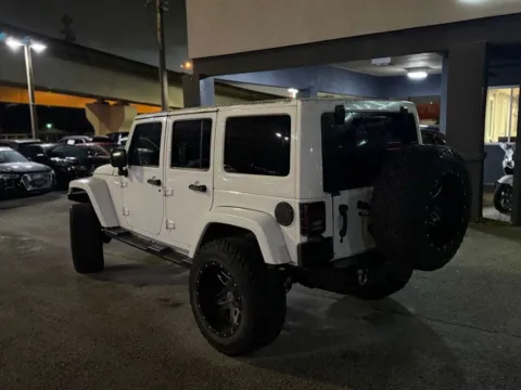 Another view of 2013 Jeep Wrangler Unlimited Sahara for sale in Jacksonville, FL at AUTOLAND