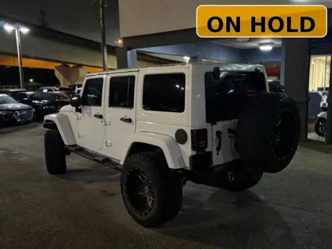Another view of 2013 Jeep Wrangler Unlimited Sahara for sale in Jacksonville, FL at AUTOLAND