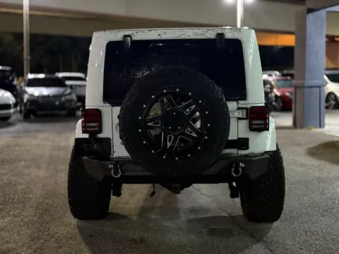 More photos of 2013 Jeep Wrangler Unlimited Sahara at AUTOLAND, FL