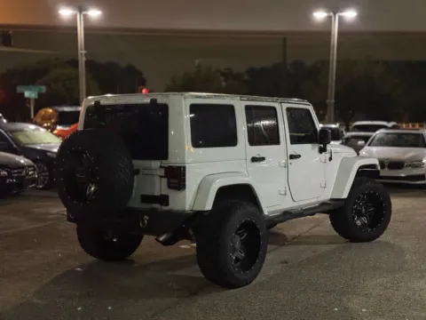 More photos of 2013 Jeep Wrangler Unlimited Sahara at AUTOLAND, FL