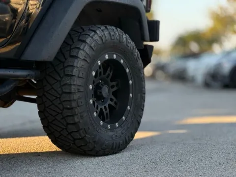 Another view of 2012 Jeep Wrangler Sport for sale in Jacksonville, FL at AUTOLAND