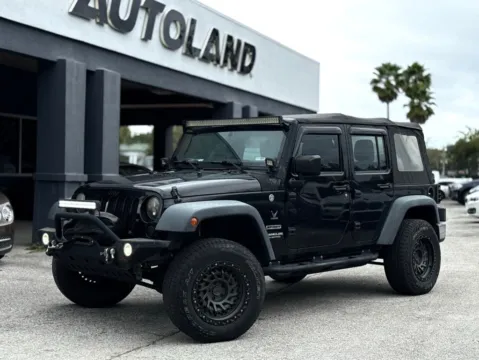 Black 2016 Jeep Wrangler Unlimited Sport for sale in Jacksonville, FL
