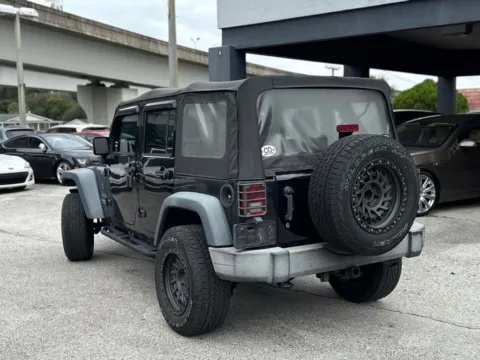 Another view of 2016 Jeep Wrangler Unlimited Sport for sale in Jacksonville, FL at AUTOLAND