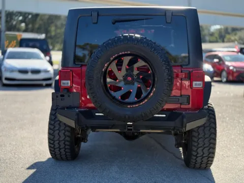 More photos of 2014 Jeep Wrangler Unlimited Sahara at AUTOLAND, FL