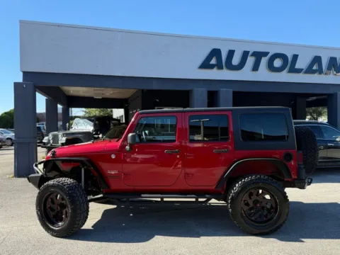 Another view of 2014 Jeep Wrangler Unlimited Sahara for sale in Jacksonville, FL at AUTOLAND