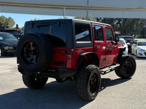 More photos of 2014 Jeep Wrangler Unlimited Sahara at AUTOLAND, FL