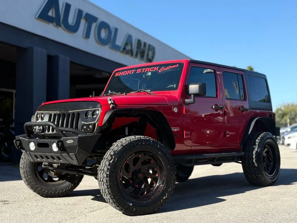 Red 2014 Jeep Wrangler Unlimited Sahara for sale in Jacksonville, FL