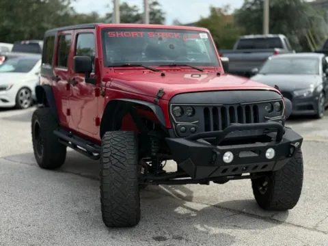 More photos of 2014 Jeep Wrangler Unlimited Sahara at AUTOLAND, FL