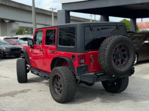 Another view of 2014 Jeep Wrangler Unlimited Sahara for sale in Jacksonville, FL at AUTOLAND