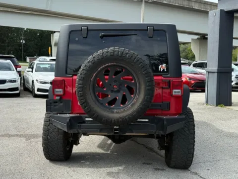 More photos of 2014 Jeep Wrangler Unlimited Sahara at AUTOLAND, FL