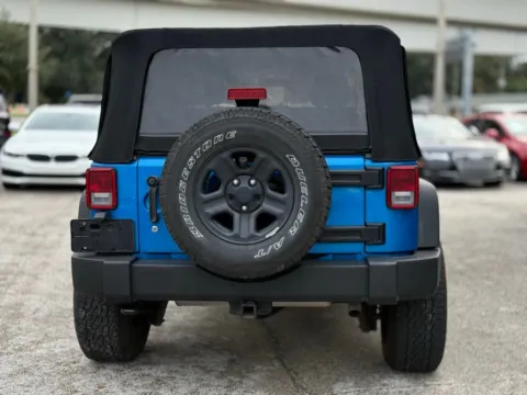 More photos of 2015 Jeep Wrangler Sport at AUTOLAND, FL