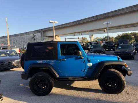 More photos of 2015 Jeep Wrangler Sport at AUTOLAND, FL