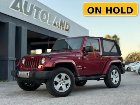 Red 2012 Jeep Wrangler Sahara for sale in Jacksonville, FL