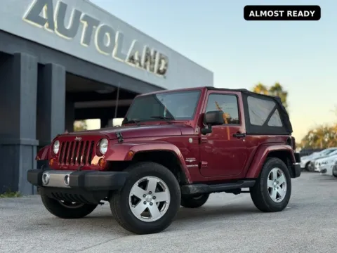 Red 2012 Jeep Wrangler Sahara for sale in Jacksonville, FL