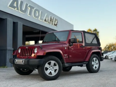 Red 2012 Jeep Wrangler Sahara for sale in Jacksonville, FL
