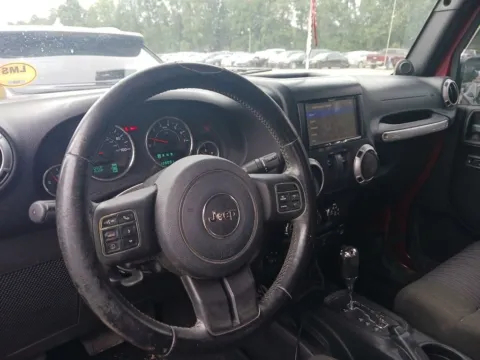 More photos of 2012 Jeep Wrangler Sahara at AUTOLAND, FL