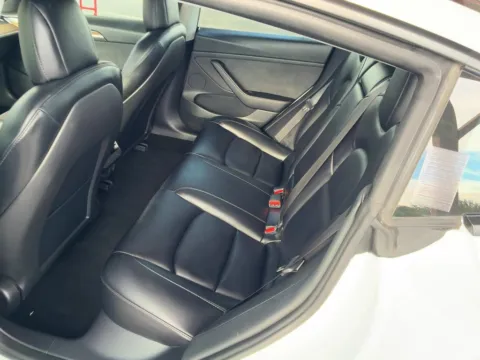 More photos of 2021 Tesla Model 3 Standard Range Plus at AUTOLAND, FL