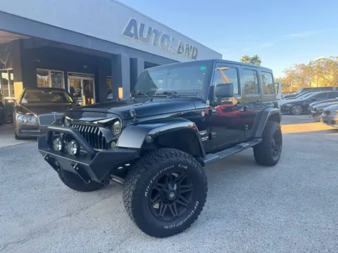 Black 2012 Jeep Wrangler Unlimited Sahara for sale in Jacksonville, FL