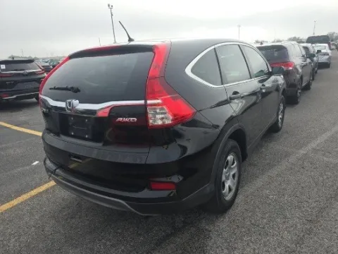 Photos of 2015 Honda CR-V LX for sale in Plano, TX at Gulliver Auto Group