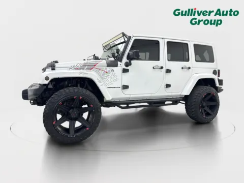 Photos of 2016 Jeep Wrangler Unlimited Sahara for sale in Plano, TX at Gulliver Auto Group