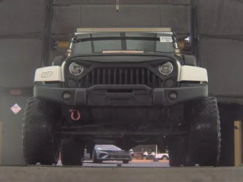 Another view of 2016 Jeep Wrangler Unlimited Sahara for sale in Plano, TX at Gulliver Auto Group