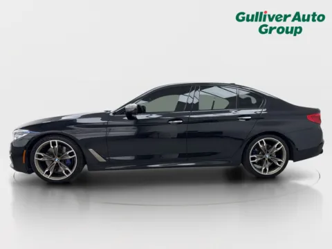 Another view of 2018 BMW 5 Series M550i xDrive for sale in Plano, TX at Gulliver Auto Group