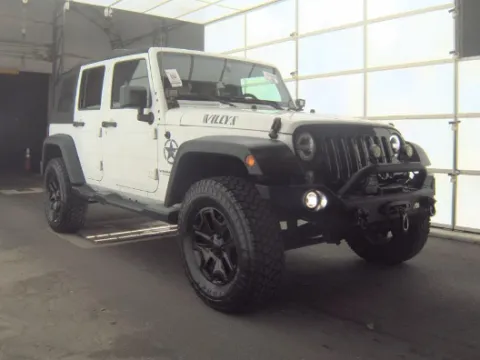 Another view of 2017 Jeep Wrangler Unlimited Willys for sale in Plano, TX at Gulliver Auto Group