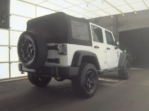 Another view of 2017 Jeep Wrangler Unlimited Willys for sale in Plano, TX at Gulliver Auto Group