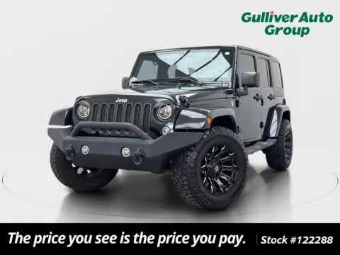 Photos of 2014 Jeep Wrangler Unlimited Sahara for sale in Plano, TX at Gulliver Auto Group
