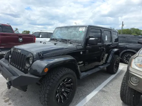 Black 2014 Jeep Wrangler Unlimited Sahara for sale in Plano, TX