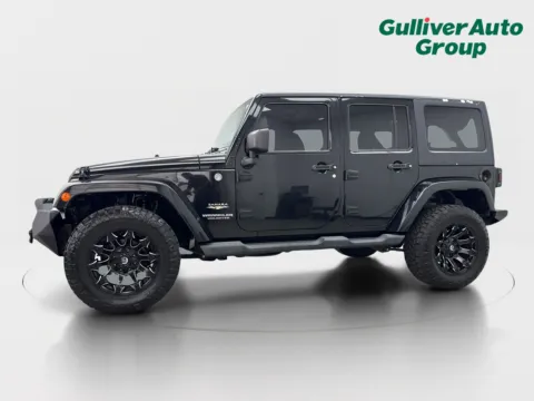 Photos of 2014 Jeep Wrangler Unlimited Sahara for sale in Plano, TX at Gulliver Auto Group