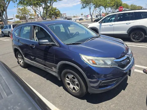 Photos of 2015 Honda CR-V LX for sale in Plano, TX at Gulliver Auto Group