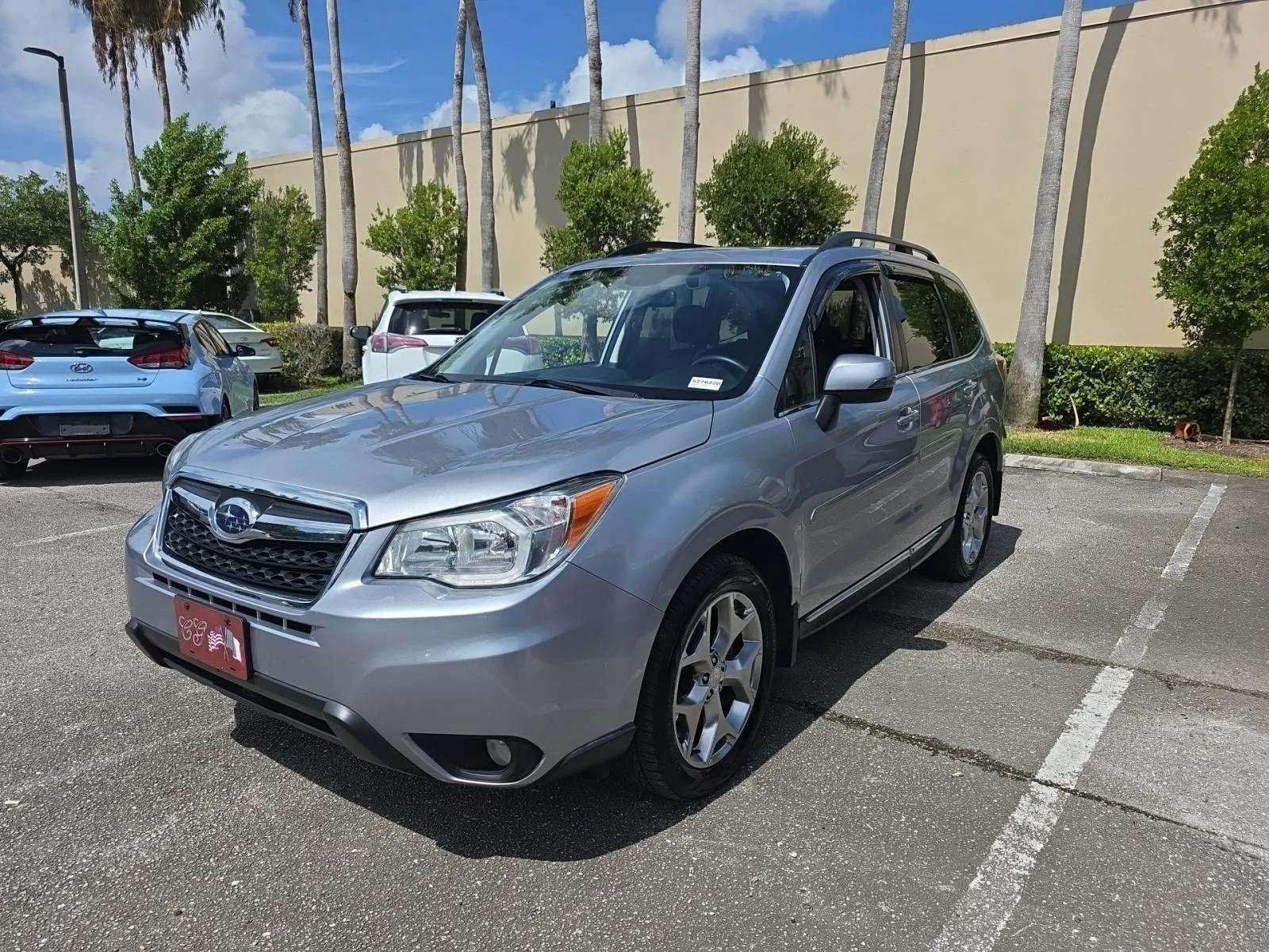 Silver 2015 Subaru Forester 2.5i Touring for sale in Plano, TX