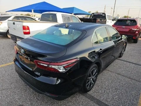 Photos of 2021 Toyota Camry Hybrid XLE for sale in Plano, TX at Gulliver Auto Group