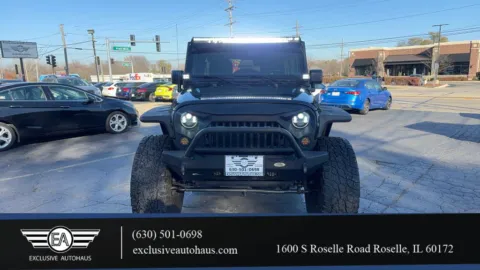 Black 2015 Jeep Wrangler Unlimited Sahara Sport Utility 4D for sale in Roselle, IL