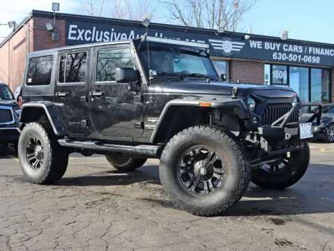 Photos of 2015 Jeep Wrangler Unlimited Sahara Sport Utility 4D for sale in Roselle, IL at Exclusive Autohaus - Roselle