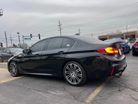 Another view of 2019 BMW 5 Series M550i xDrive Sedan 4D for sale in Roselle, IL at Exclusive Autohaus - Roselle