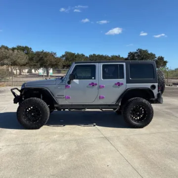 Photos of 2016 Jeep Wrangler Unlimited Sport SUV 4D for sale in Roselle, IL at Exclusive Autohaus - Roselle