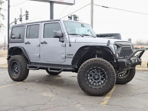 Photos of 2016 Jeep Wrangler Unlimited Sport SUV 4D for sale in Roselle, IL at Exclusive Autohaus - Roselle
