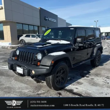 Black 2013 Jeep Wrangler Unlimited Sahara Moab Sport Utility 4D for sale in Roselle, IL