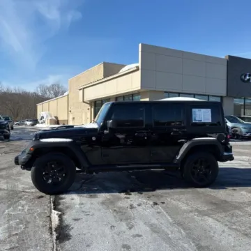 Photos of 2013 Jeep Wrangler Unlimited Sahara Moab Sport Utility 4D for sale in Roselle, IL at Exclusive Autohaus - Roselle