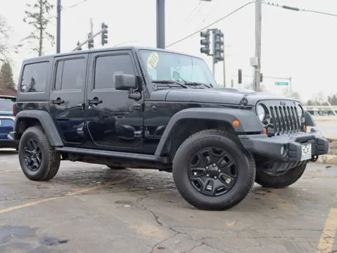 Photos of 2013 Jeep Wrangler Unlimited Sahara Moab Sport Utility 4D for sale in Roselle, IL at Exclusive Autohaus - Roselle
