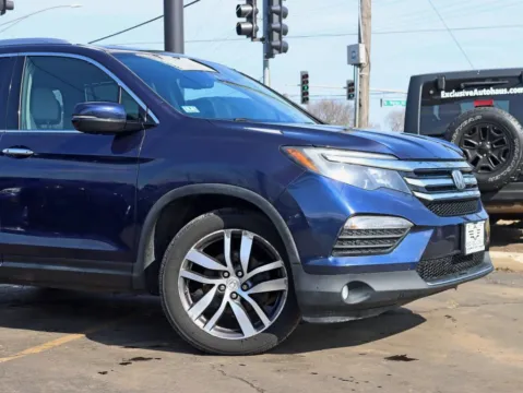 Another view of 2016 Honda Pilot Elite Sport Utility 4D for sale in Roselle, IL at Exclusive Autohaus - Roselle